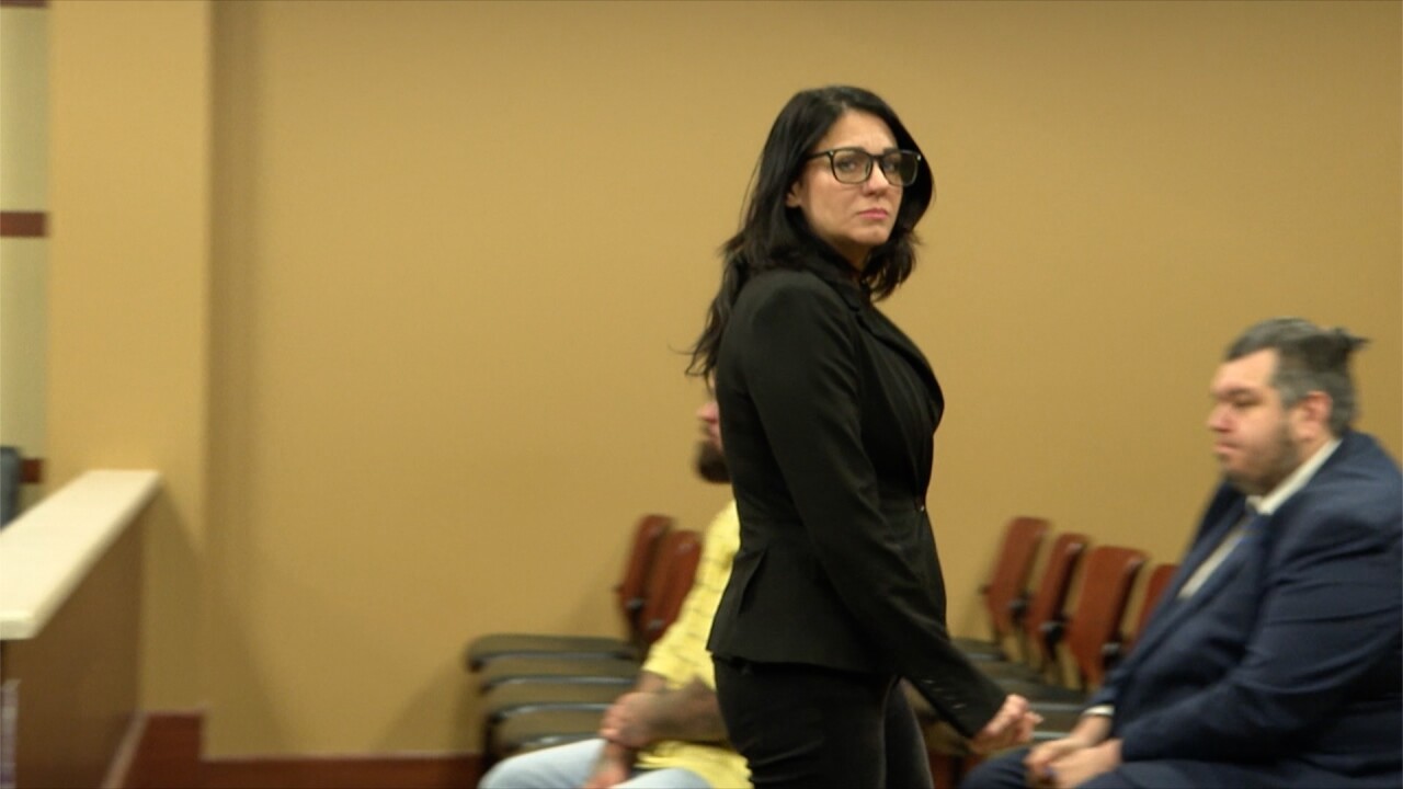 Edith Corbett walking in 63rd District Court